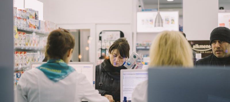 Pharmacy Technicians working in a pharmaceutical setting.